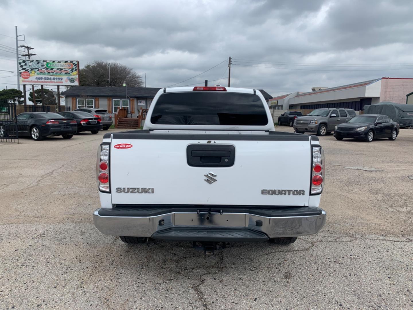 2012 White Suzuki Equator Sport Crew Cab 2WD (5Z61D0ER4CC) with an 4.0L V6 DOHC 24V engine, Automatic transmission, located at 1830 North Belt Line Road, Irving, TX, 75061, (469) 524-0199, 32.834373, -96.993584 - Photo#2